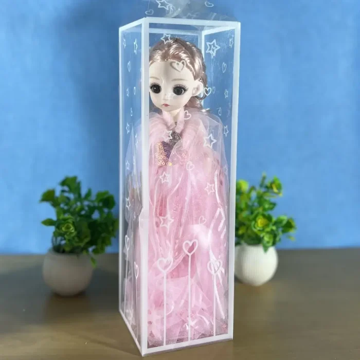 Close-up of four princess dolls, showing detailed faces and shiny, flowing hair